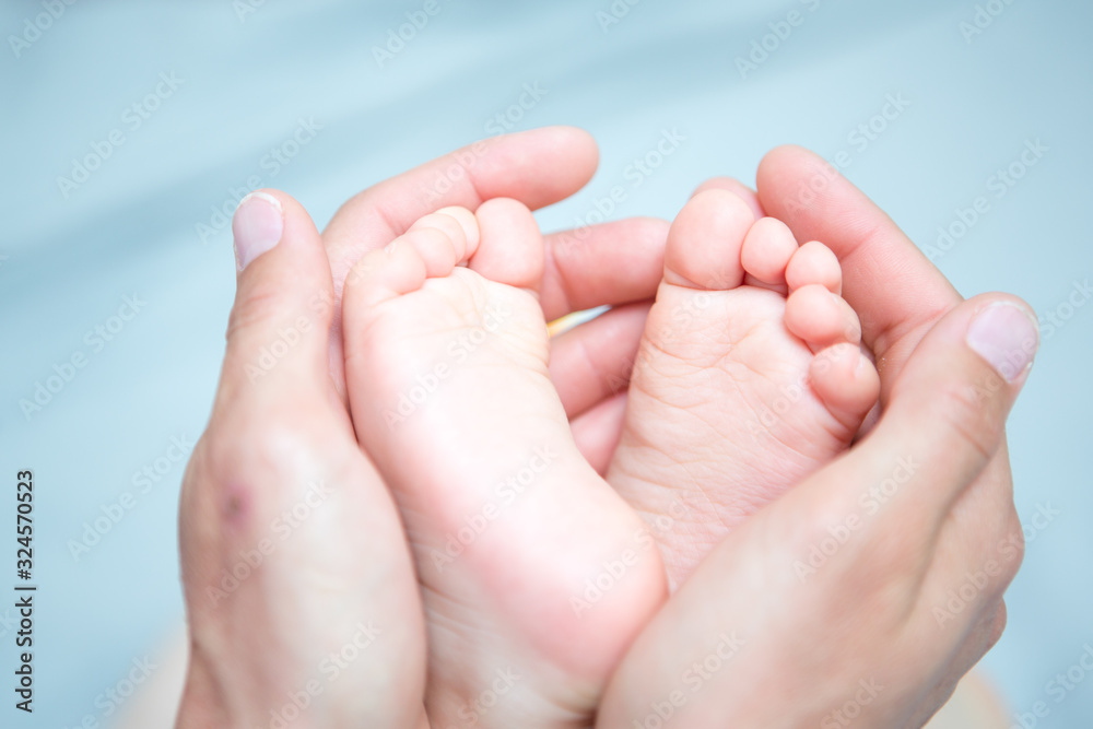 Childhood. Close-up of feet and hands Childhood. Close-up of feet and hands