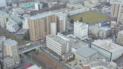 Tokyo Suburbs, Slow tilt revealing neighborhood in early morning photo