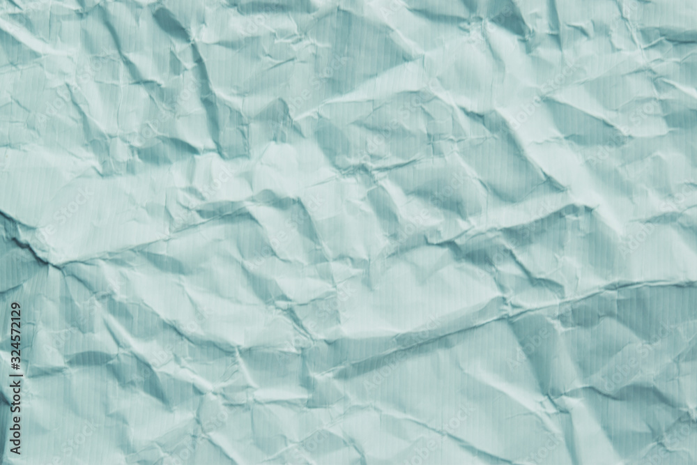 Obraz premium crumbled paper in soft pastel blue green color tone