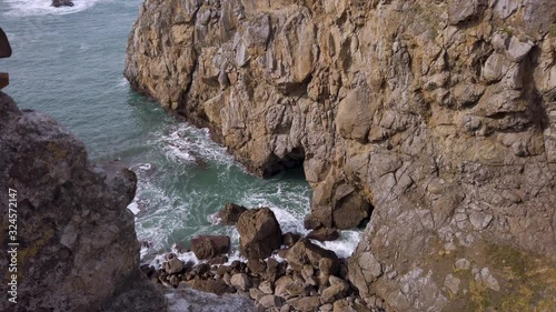 Coastal shot of San Juan de Gaztelugatxe where the rough seas and huge cliffs surround the scenery.
