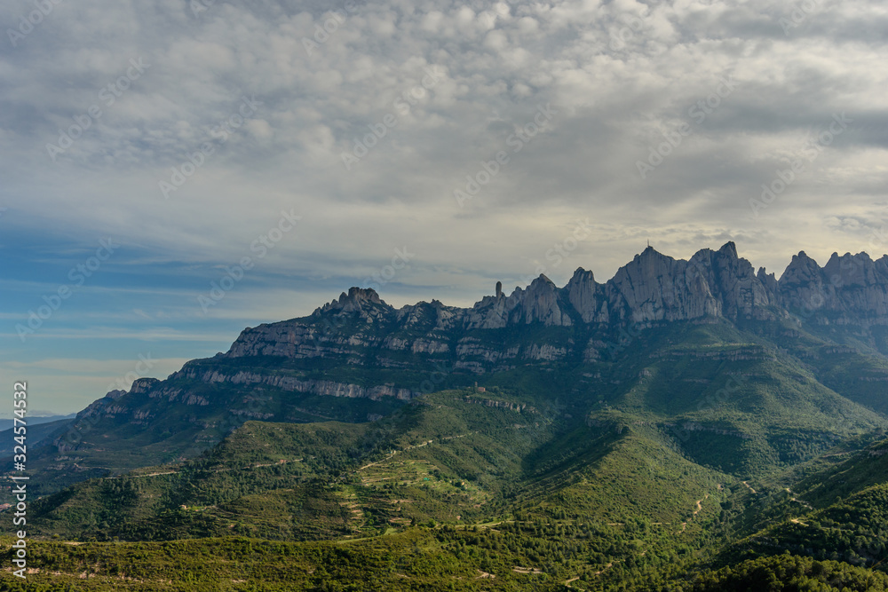 Naklejka premium Grey clouds over the mountains.
