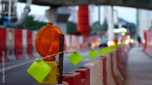 Flashing orange light, road repair work