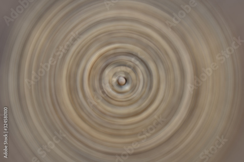 Abstract Swirling radial pattern background. illustration for swirl design. © Rutsada