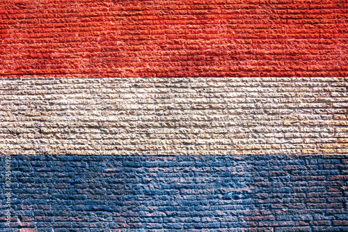 Fototapet Netherlands dutch flag painted on a walll, background, texture.