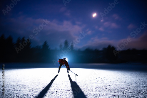 Hockey game illustration photo, silhouette of player, edit space.