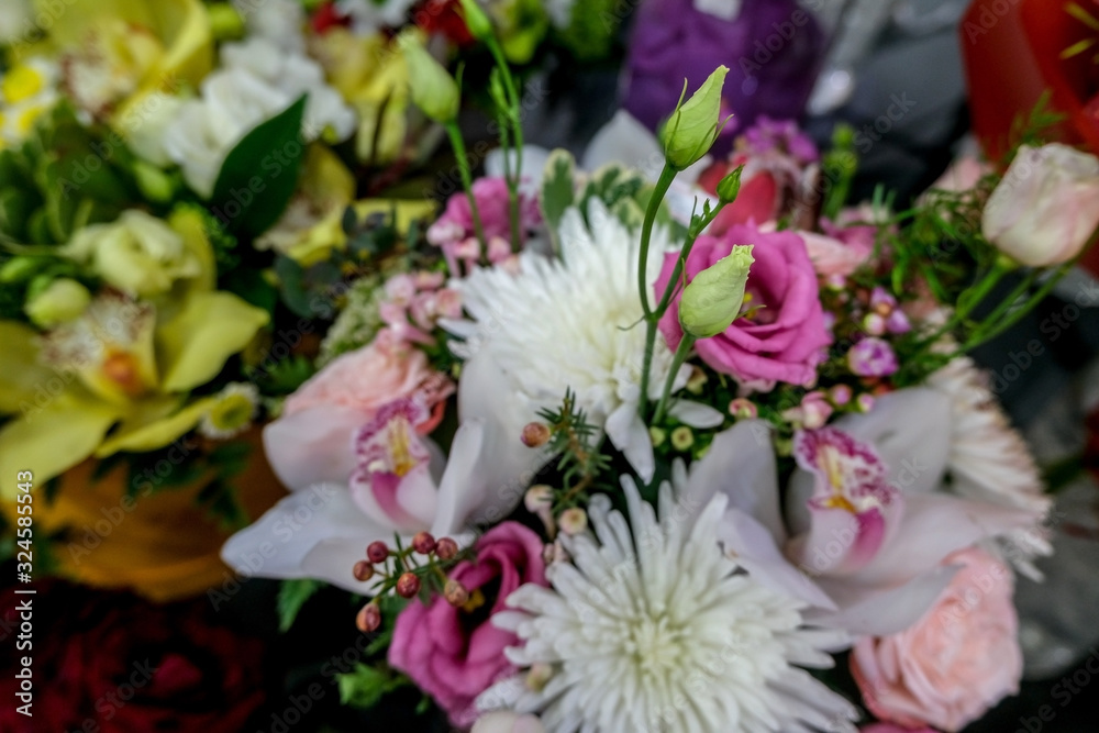 Beautiful bouquet of mixed flowers. Floral shop, flower market. Selective focus.