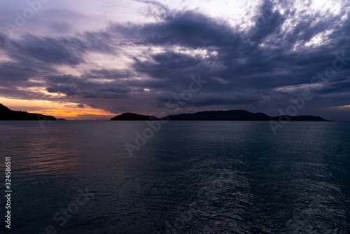 Sunrise over seychelles islands. Dark and purple sky