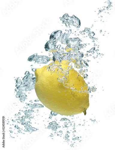 lemon is dropped into water