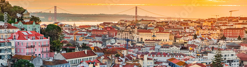 A view of the Alfama downtown and the 25 April Bridge.