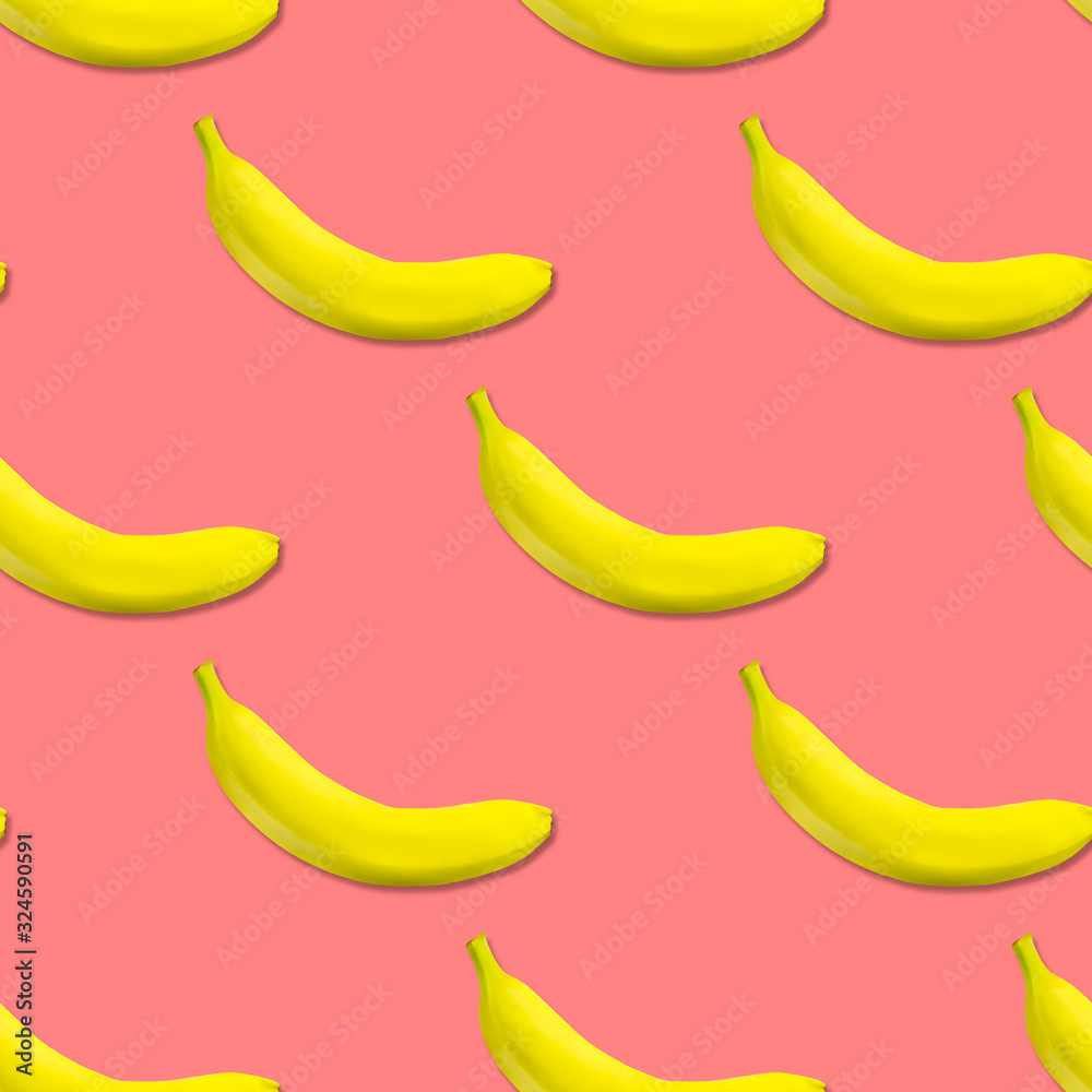 Seamless pattern of yellow bananas on a pink background. Banana print