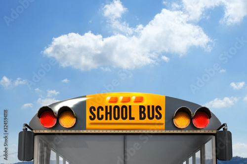 Yellow school bus outdoors, closeup. Transport for students