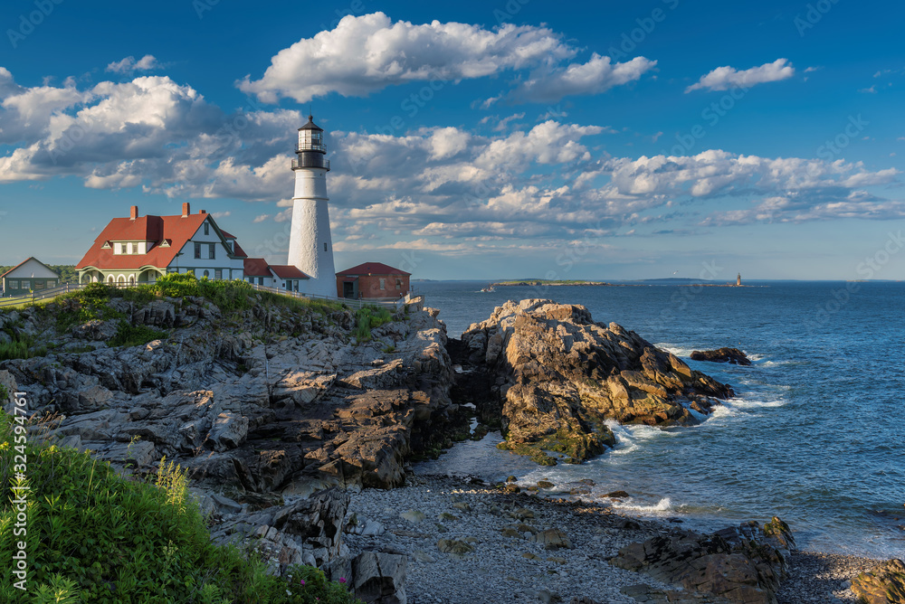 Portland Head Lighthouse at sunset in Cape Elizabeth, New England, Maine, USA.	