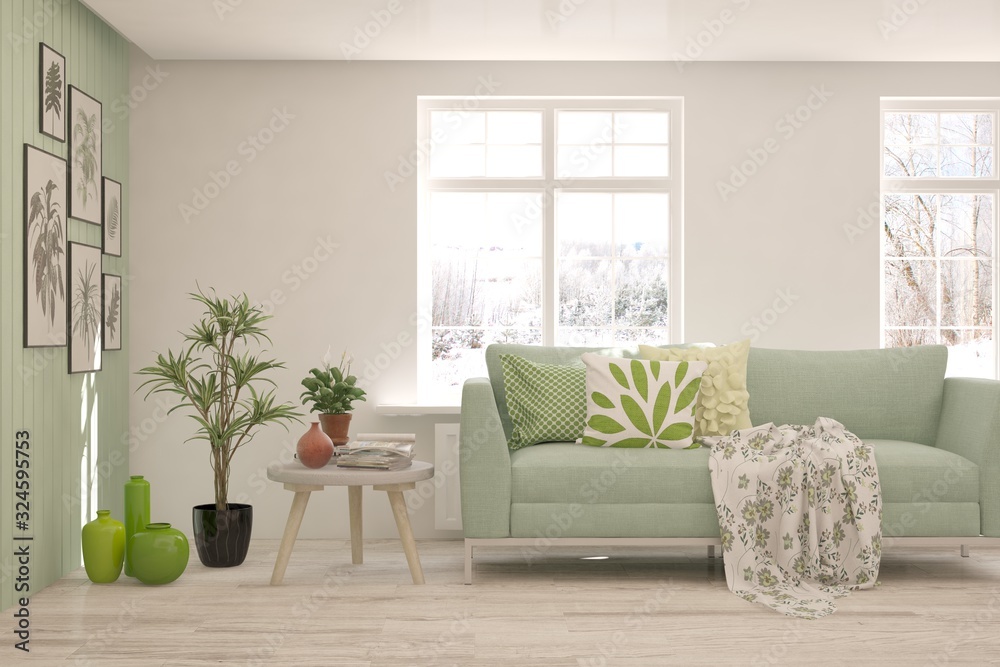 Naklejka premium Modern living room in white color with sofa and winter landscape in window. Scandinavian interior design. 3D illustration