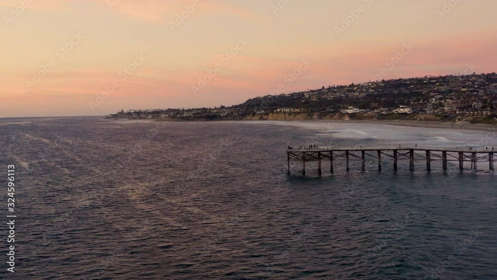 The Calm Ocean Waters Of Pacific Beach California With View Of Its Cityscape And Tall Building At The Coast - Aerial Shot The Calm Ocean Waters Of Pacific Beach California With View Of Its Cityscape And Tall Building At The Coast - Aerial Shot
