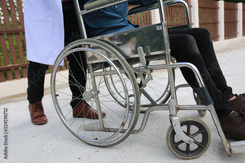 Physical therapist Disabled wheelchair with professional care.concept