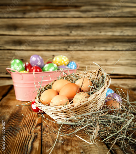 Easter eggs on wooden table and free space for your decoration. 