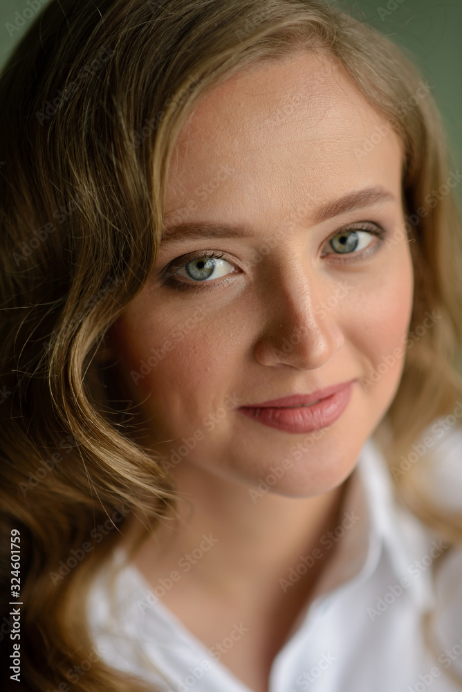 Happy young woman looking at camera with smile Happy young woman looking at camera with smile