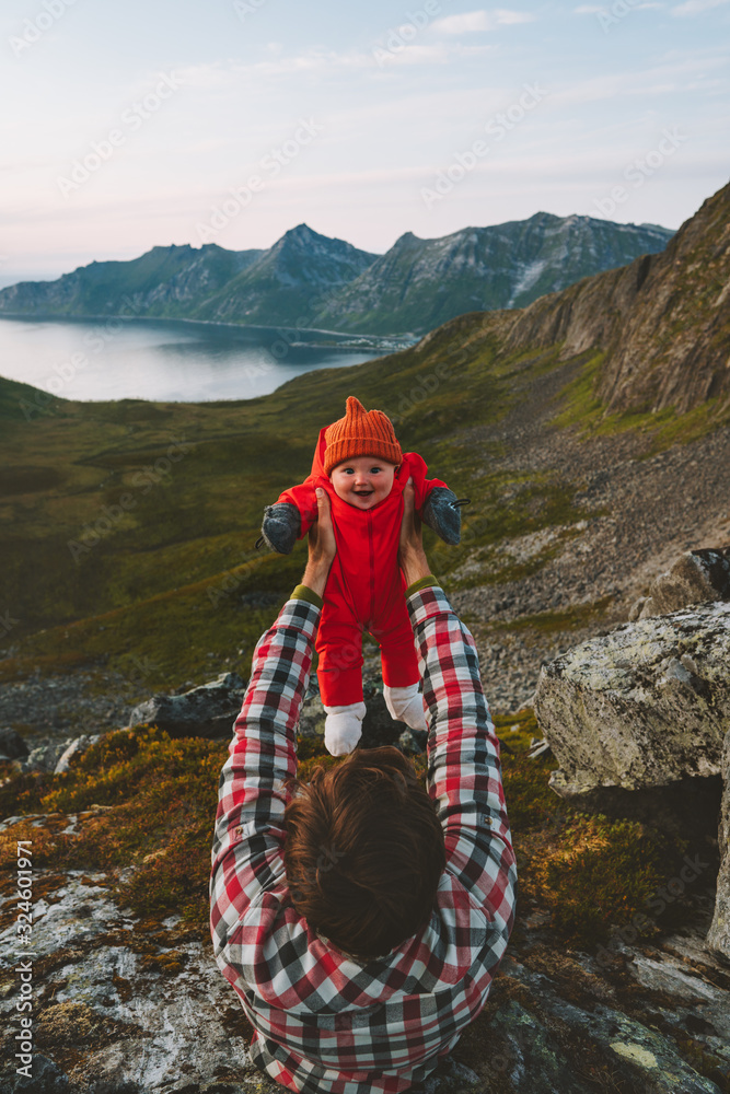 Baby with father family traveling in mountains healthy lifestyle outdoor adventure vacations with kids vibes in Norway