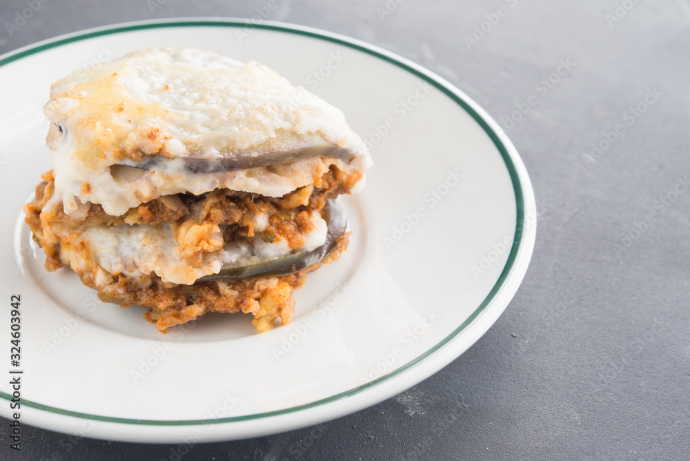 moussaka, eggplant of aubergine. In black background moussaka, eggplant of aubergine. In black background