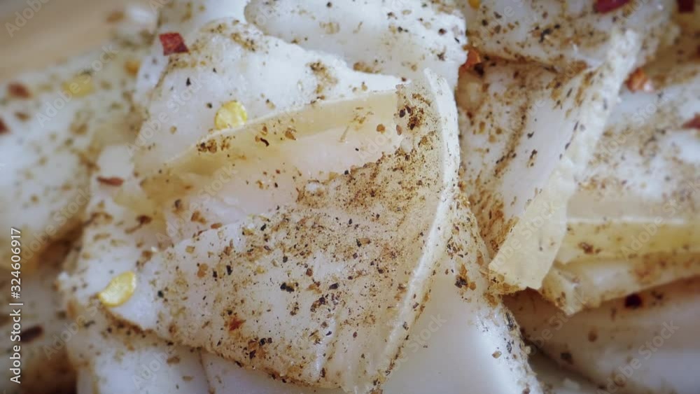 Pork fat sliced ​​on a board , pork sliced ​​closeup