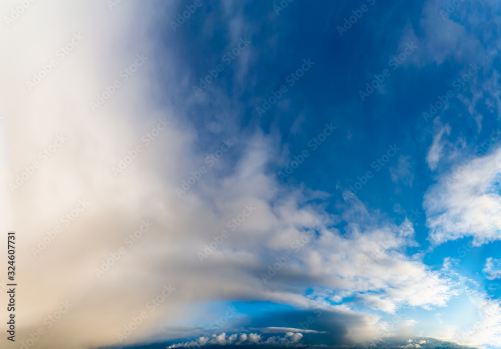 Obraz premium Fantastic clouds against blue sky, panorama