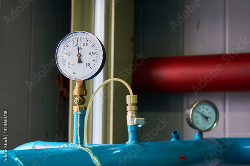 Pressure gauge showing the pressure on the water pipe.