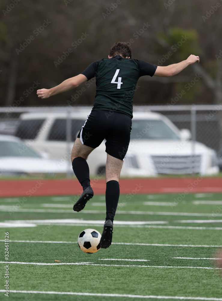 Boy Soccer Players making exciting plays during a soccer game Boy Soccer Players making exciting plays during a soccer game