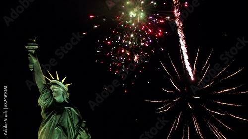 Fireworks over Statue of Liberty for New Year or Independence Day - Fourth (4th) of July - Wide - Stock Video Clip Footage