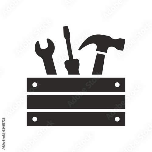 Toolbox with tools. Spanner, screwdriver and hammer icon. Vector icon isolated on white background.