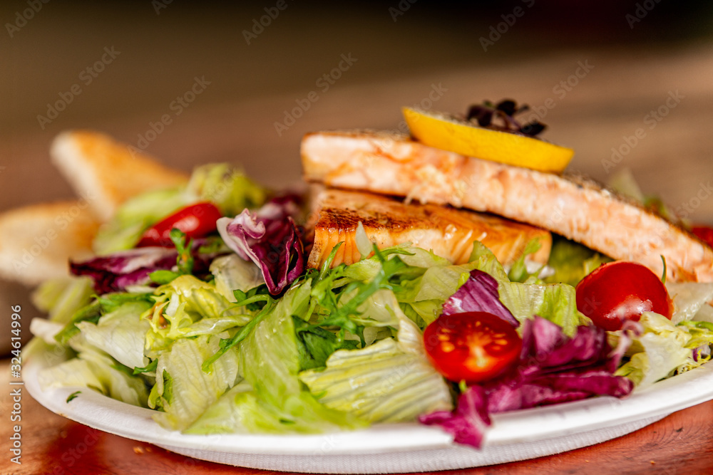 Fresh garden salad. Fresh garden salad on a plate. Fresh and healthy vegetable salad with meat