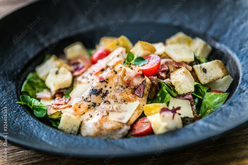 Fresh garden salad. Fresh garden salad on a plate. Fresh and healthy vegetable salad with meat Fresh garden salad. Fresh garden salad on a plate. Fresh and healthy vegetable salad with meat