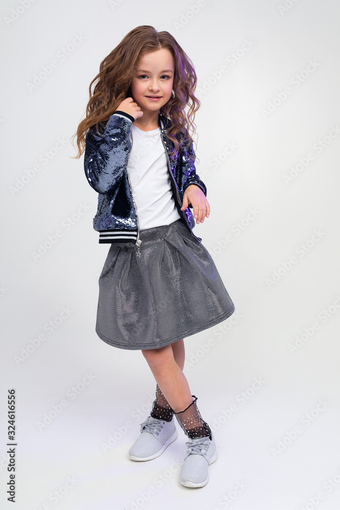 full-length photo of an attractive girl in a festive image on a white studio background full-length photo of an attractive girl in a festive image on a white studio background