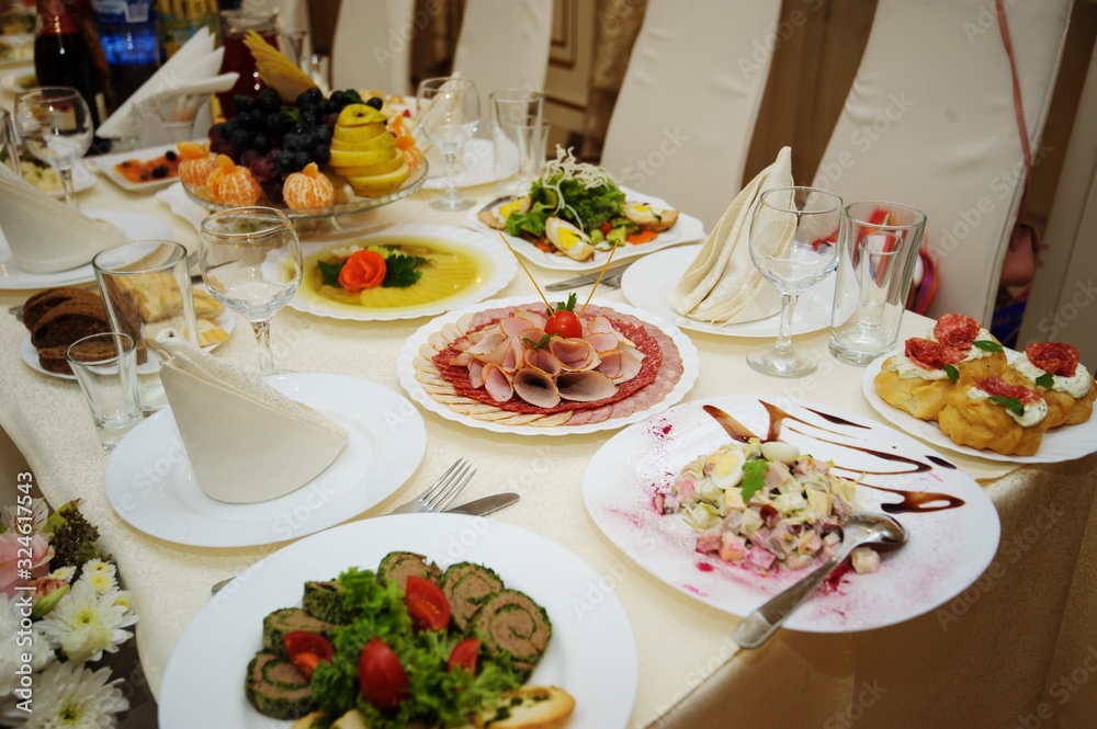 table full of different food. Restaurant party