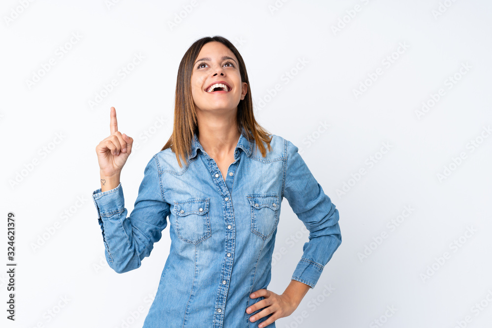 Young woman over isolated white background pointing up and surprised Young woman over isolated white background pointing up and surprised