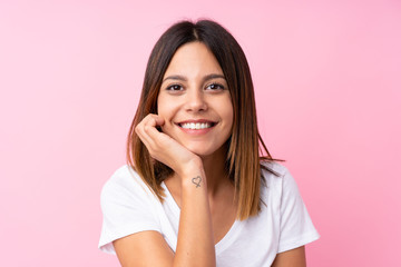 Young woman over isolated pink background