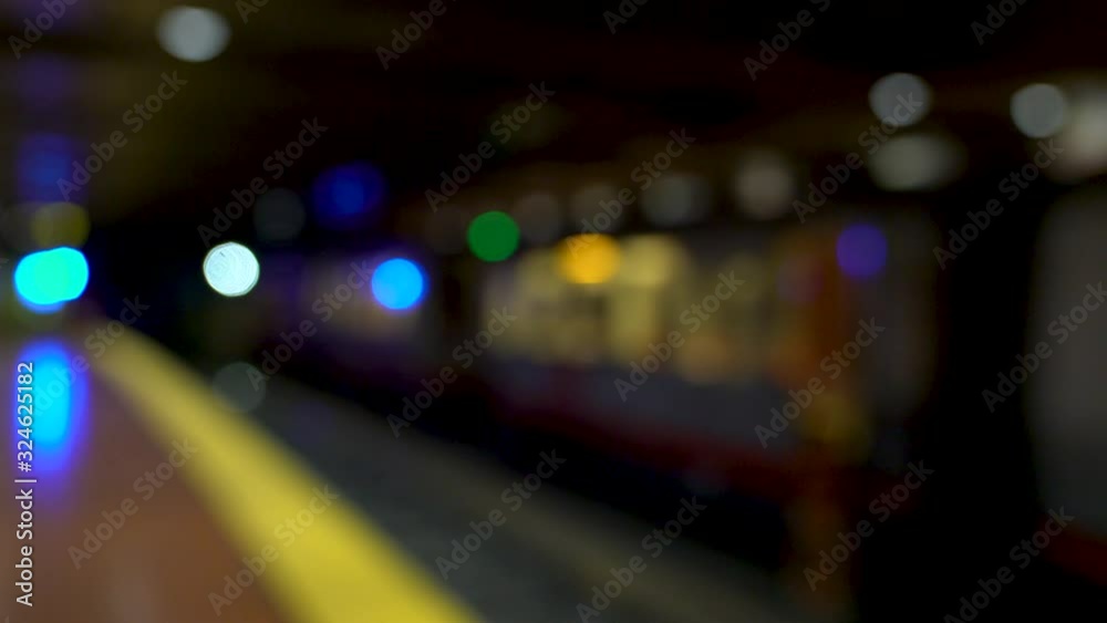 San Francisco, California, USA - August 2019: Muni subway train departing from Castro station. Video shot out of focus intentionally and originally San Francisco, California, USA - August 2019: Muni subway train departing from Castro station. Video shot out of focus intentionally and originally