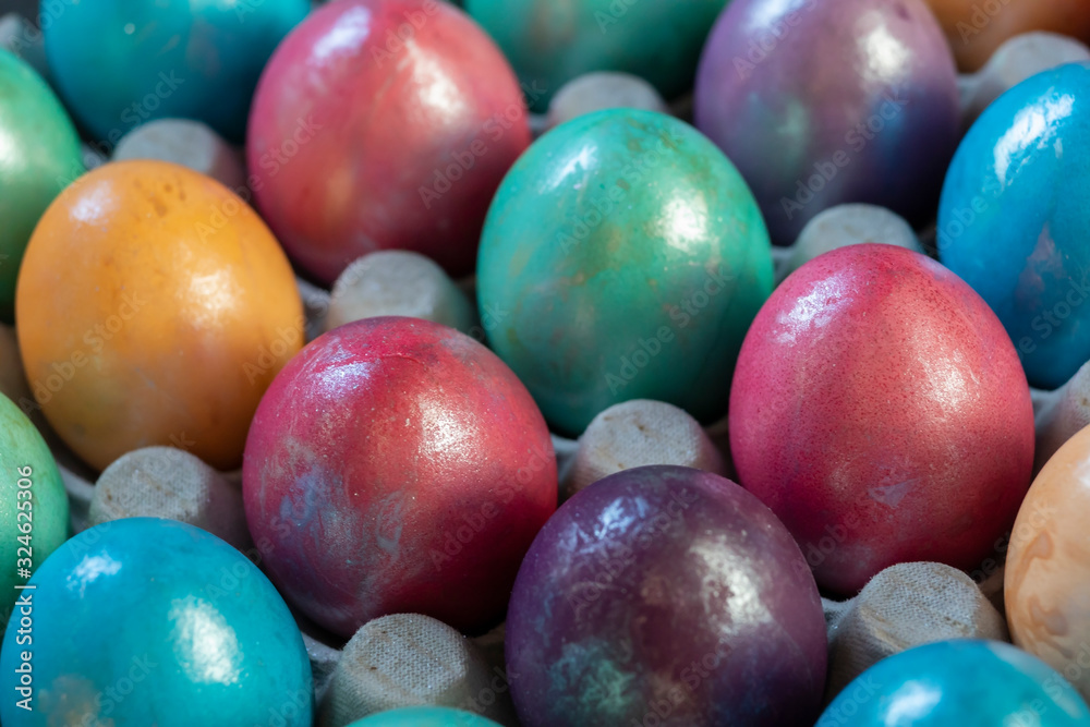 Easter background with hand painted purple, blue, green, orange Easter background with hand painted purple, blue, green, orange