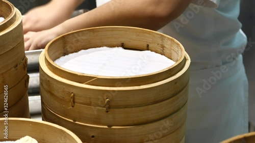 Close up of precessing dumplings at cafe  photo