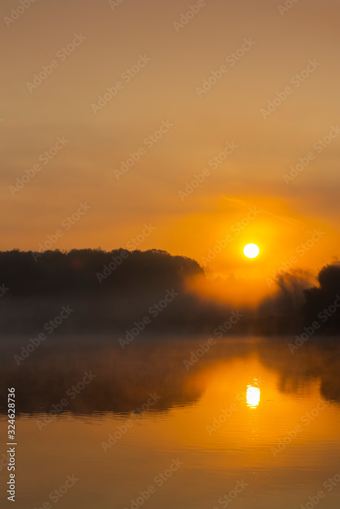 Sunrise on Jenoi pond near Diosjeno, Northern Hungary