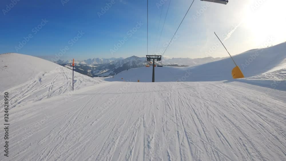 alpine skiing below the chairlift in the swiss alps, no people alpine skiing below the chairlift in the swiss alps, no people