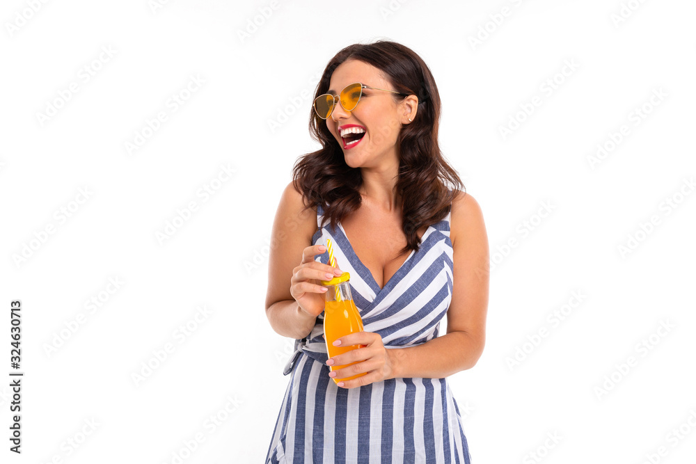 Portrait of nice caucasian girl drinks juice isolated on white background Portrait of nice caucasian girl drinks juice isolated on white background