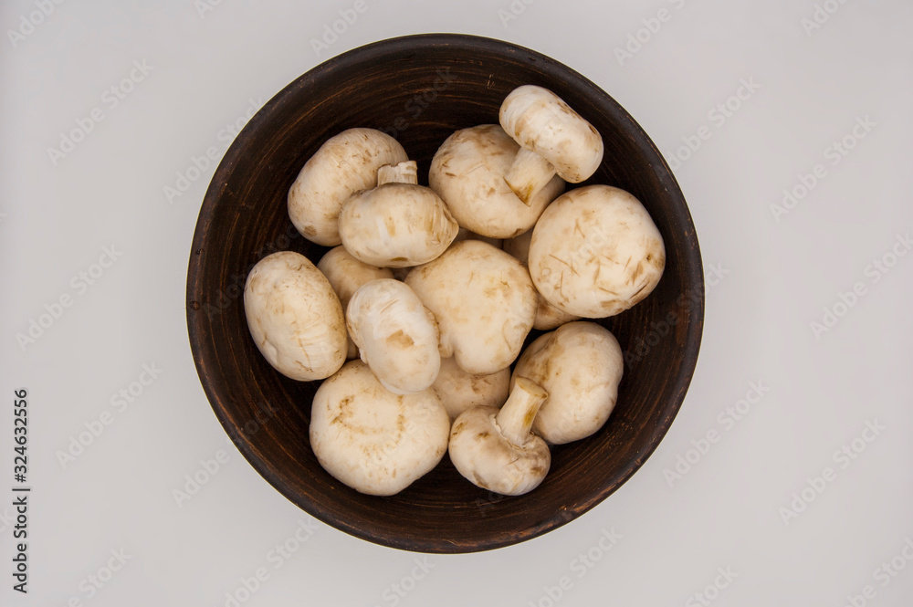 Fresh champignons isolated in white background Fresh champignons isolated in white background