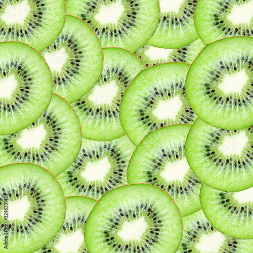 Kiwi slices background. Green fruit square pattern. Graphic design copy cut fruit section.