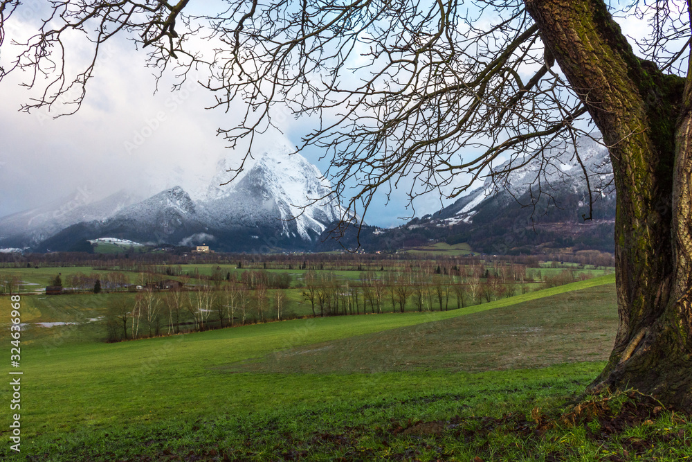 Winter landscape with snow covered Grimming mountain in Ennstal, Steiermark, Austria Winter landscape with snow covered Grimming mountain in Ennstal, Steiermark, Austria