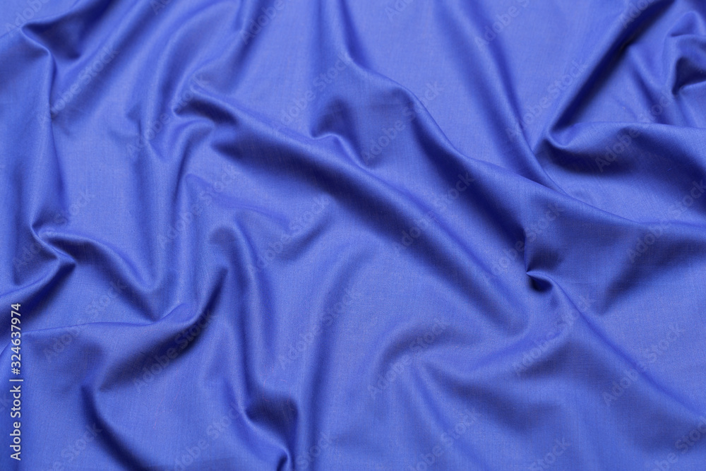 Blue fabric cloth texture. abstract texture background with soft waves. Blue fabric cloth texture. abstract texture background with soft waves.