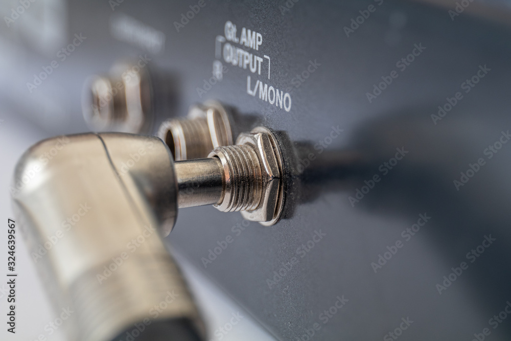 Jack plug and socket for electric guitar