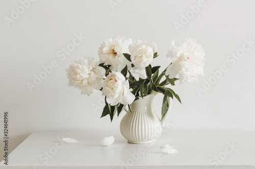Fototapeta Naklejka Na Ścianę i Meble -  peonies flowers in vase on white background