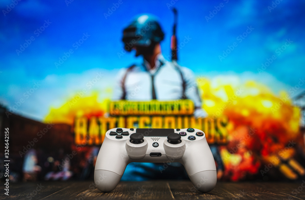 Odessa, Ukraine - May 13, 2019. White playstation 4 gamepad on the  background of the game PUBG. PLAYERUNKNOWN'S BATTLEGROUNDS Battle Royale  shooting game. Stock Photo | Adobe Stock