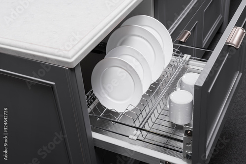 dishwasher with clean dishes, modern kitchen