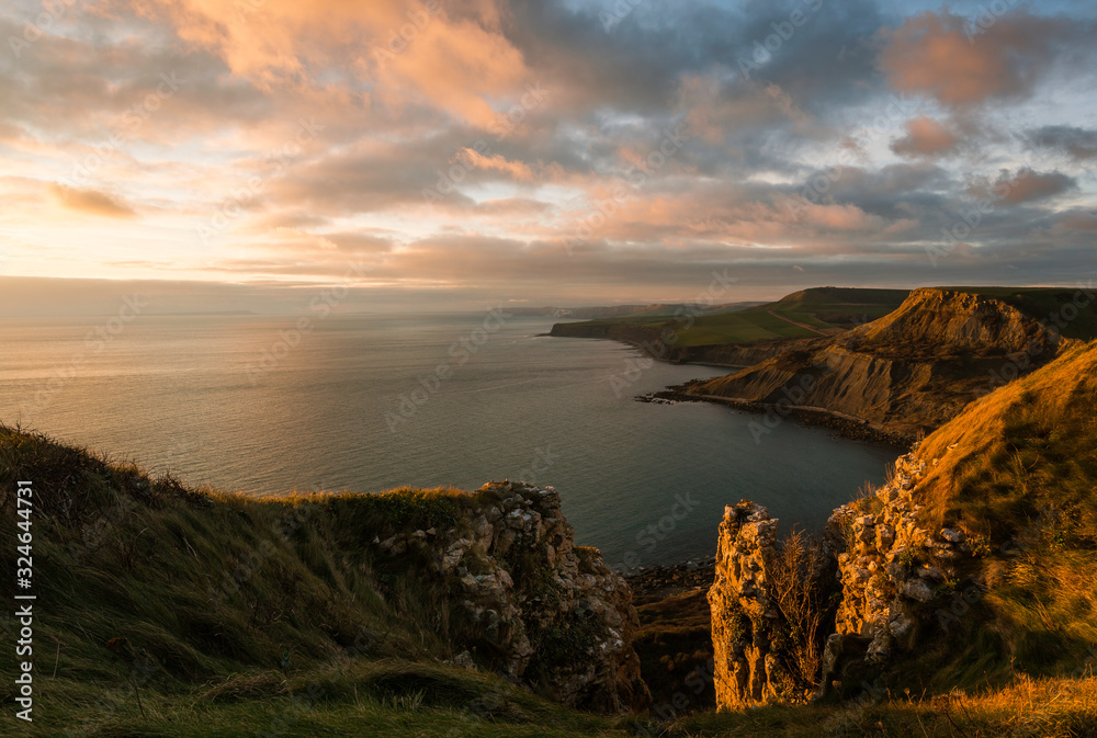 Sunset on coast of sea